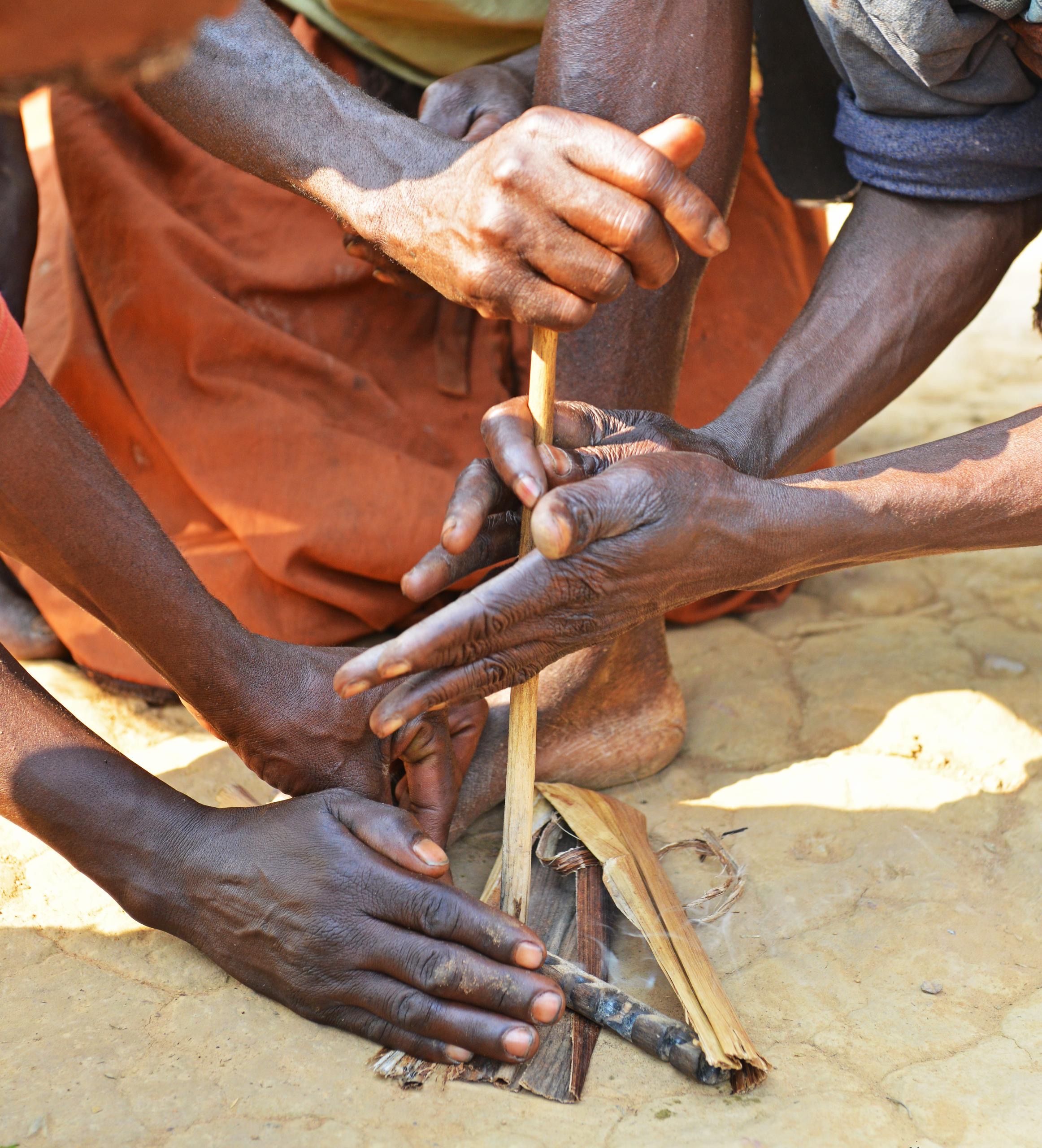 The Batwa Way of Life, Making a Fire the ancient way.